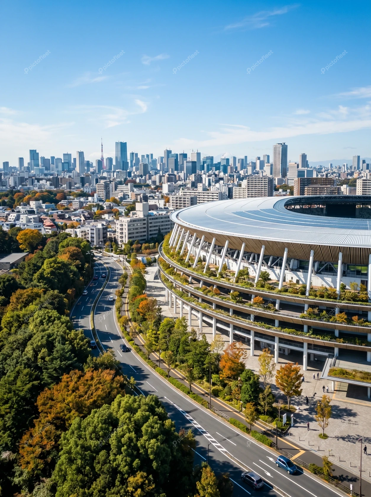 Aerial view of Japan National Stadium with Tokyo skyline