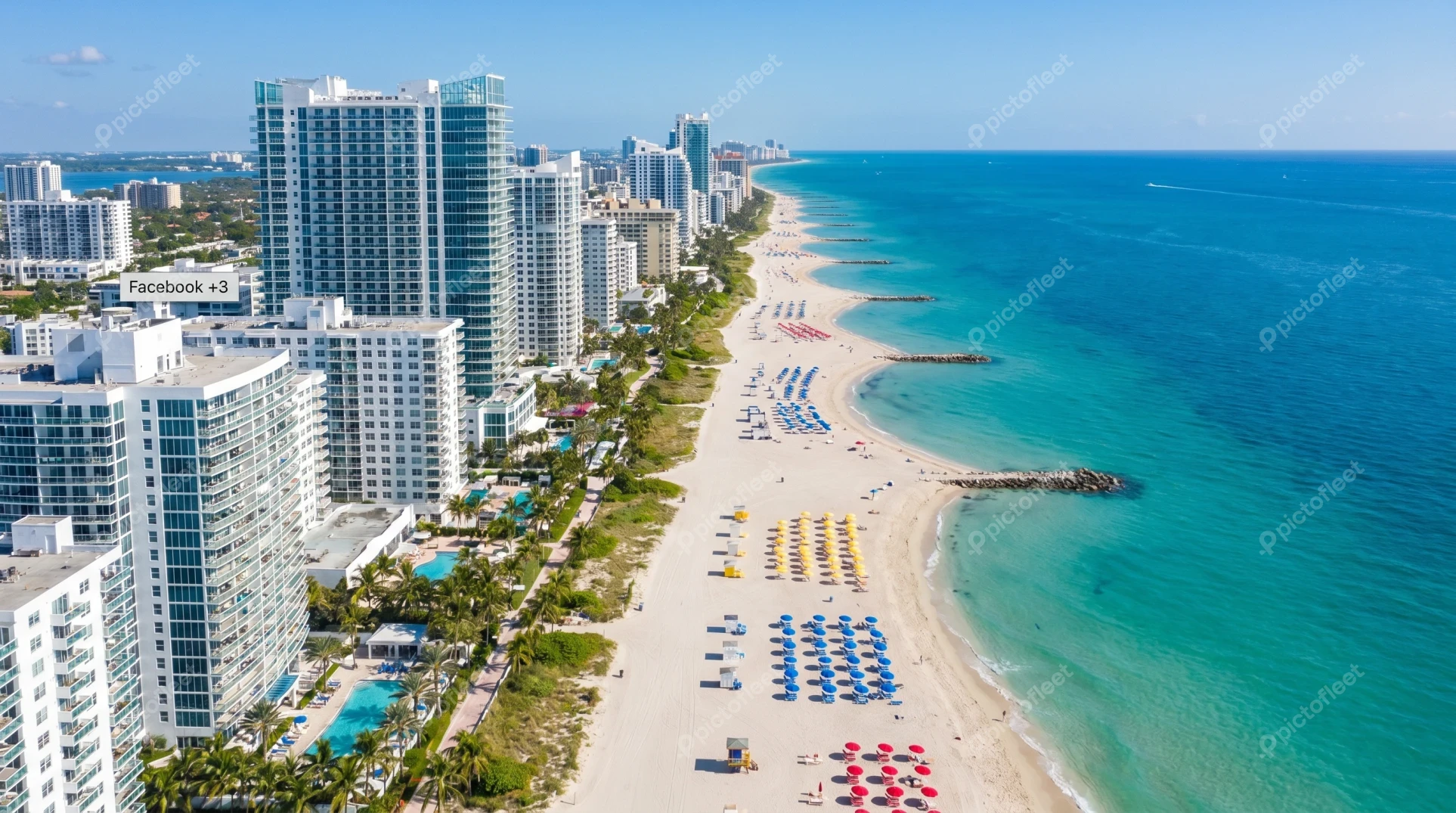 Aerial view of Miami Beach coastline with luxury hotels
