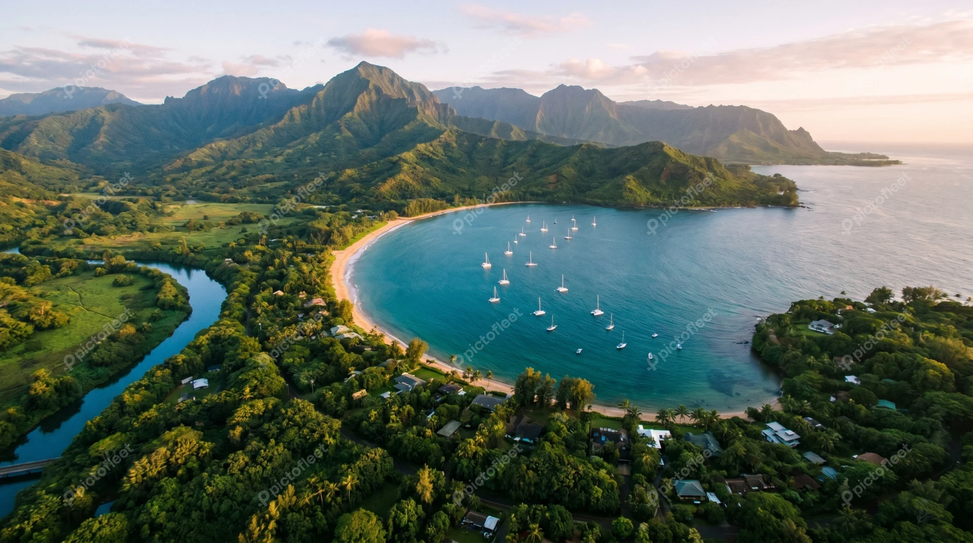 Aerial view of Hanalei Bay and mountains in Kauai Hawaii