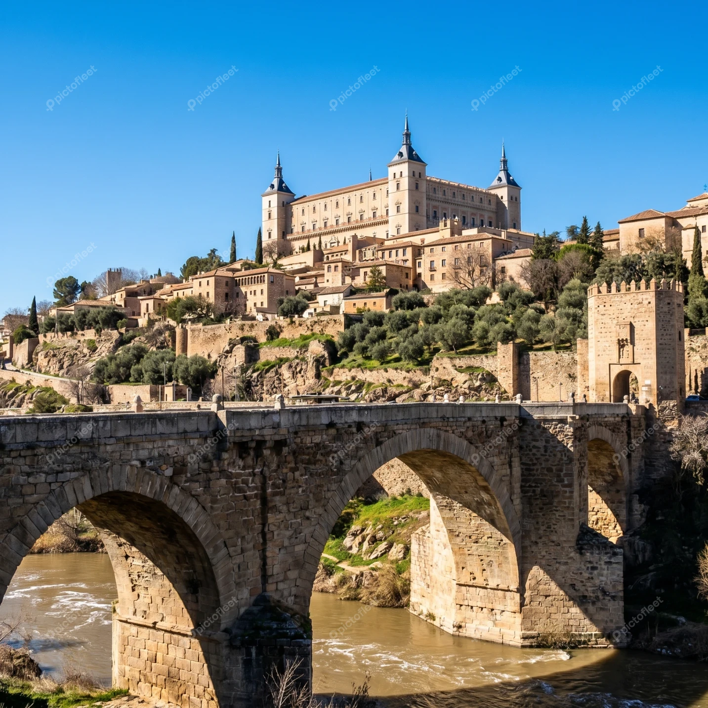 Alcazar of Toledo and San Martin Bridge in Spain